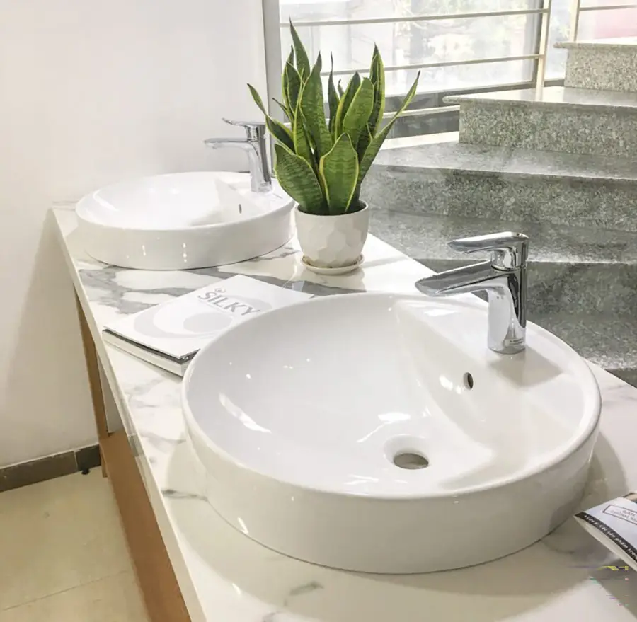 Lavabo TOTO đặt bàn hình tròn